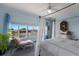Bedroom with ocean view and chaise lounge at 16271 N Island Ct, Boca Grande, FL 33921