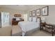 Bright bedroom with a king-size bed and access to hallway at 16271 N Island Ct, Boca Grande, FL 33921