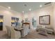 Bright dining room with ocean views and a casual seating area at 16271 N Island Ct, Boca Grande, FL 33921