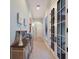 Elegant hallway with decorative tile floor and antique furniture at 16271 N Island Ct, Boca Grande, FL 33921
