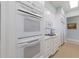 Well-equipped kitchen with double oven and ample storage at 16271 N Island Ct, Boca Grande, FL 33921