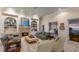 Spacious living room with fireplace and sunset views at 16271 N Island Ct, Boca Grande, FL 33921