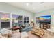 Bright living room with ocean views and comfortable seating at 16271 N Island Ct, Boca Grande, FL 33921