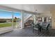 Lower lanai with outdoor dining set and beach view at 16271 N Island Ct, Boca Grande, FL 33921