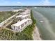 Waterfront condo community showcasing multiple buildings and boat access at 1751 Beach Rd # 403, Englewood, FL 34223
