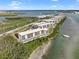 Aerial view of waterfront property, highlighting its prime location and expansive views at 1751 Beach Rd # 403, Englewood, FL 34223