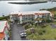Waterfront condo with lush landscaping and parking area at 1751 Beach Rd # 403, Englewood, FL 34223