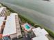 Community pool area with waterfront access at 1751 Beach Rd # 403, Englewood, FL 34223