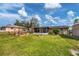 Large backyard with patio, shed and fenced area at 1780 Morning Dove Ln, Englewood, FL 34224