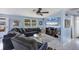 Spacious living room featuring a large sectional sofa at 1780 Morning Dove Ln, Englewood, FL 34224