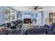 Cozy living room with ample natural light and sectional sofa at 1780 Morning Dove Ln, Englewood, FL 34224