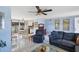 Open concept living area with a view of the kitchen at 1780 Morning Dove Ln, Englewood, FL 34224