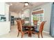 Modern kitchen with white cabinets and breakfast nook at 217 Wayne Rd, Rotonda West, FL 33947