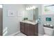 Guest bathroom with single vanity and walk-in shower at 226 Rotonda N Blvd, Rotonda West, FL 33947