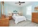 Guest bedroom with wood furniture and light walls at 226 Rotonda N Blvd, Rotonda West, FL 33947