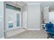 Bright entryway with wood-look floors and white doors at 226 Rotonda N Blvd, Rotonda West, FL 33947