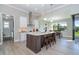 Modern kitchen with large island and stainless steel appliances at 226 Rotonda N Blvd, Rotonda West, FL 33947