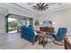 Open concept living room with sliding doors to backyard at 226 Rotonda N Blvd, Rotonda West, FL 33947