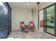 Screened-in patio with comfortable seating at 226 Rotonda N Blvd, Rotonda West, FL 33947