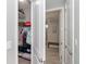 Large walk-in closet with shelving and rod for hanging clothes at 226 Rotonda N Blvd, Rotonda West, FL 33947