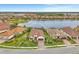Stunning property with a lake view, surrounded by other upscale homes at 26837 Weiskopf Dr, Englewood, FL 34223