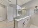 Spa-like bathroom with walk-in shower and double vanity at 26837 Weiskopf Dr, Englewood, FL 34223