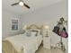 Cozy bedroom with light-colored wood furniture and window seating at 26837 Weiskopf Dr, Englewood, FL 34223