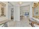 Spacious entry with views to the living room and pool at 26837 Weiskopf Dr, Englewood, FL 34223