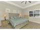 Spacious main bedroom with large bed, and plenty of storage at 26837 Weiskopf Dr, Englewood, FL 34223
