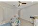 Spacious craft/office room with hardwood floors and ample storage at 26837 Weiskopf Dr, Englewood, FL 34223
