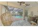 Inviting pool and patio area with covered lanai at 26837 Weiskopf Dr, Englewood, FL 34223
