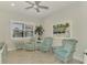 Relaxing sitting room with comfortable seating and coastal decor at 26837 Weiskopf Dr, Englewood, FL 34223