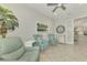 Casual sitting area with comfortable seating and view into kitchen at 26837 Weiskopf Dr, Englewood, FL 34223