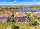 An aerial view of a home with a pool and patio at 2744 Mill Creek Rd, Port Charlotte, FL 33953