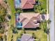 An aerial view of a home with a pool and patio at 2744 Mill Creek Rd, Port Charlotte, FL 33953
