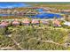 Aerial view of a beautiful home in a desirable waterfront community at 2744 Mill Creek Rd, Port Charlotte, FL 33953