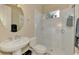 Updated bathroom with walk-in shower and pedestal sink at 2744 Mill Creek Rd, Port Charlotte, FL 33953