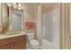 Clean bathroom with tub, shower, and updated vanity at 2744 Mill Creek Rd, Port Charlotte, FL 33953