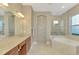 Elegant bathroom with soaking tub, walk-in shower, and double vanity at 2744 Mill Creek Rd, Port Charlotte, FL 33953