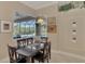 Bright breakfast nook with pool view at 2744 Mill Creek Rd, Port Charlotte, FL 33953