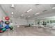 Bright fitness center with various exercise equipment and a large mirror at 2744 Mill Creek Rd, Port Charlotte, FL 33953