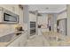 Kitchen features granite countertops and stainless steel appliances at 2744 Mill Creek Rd, Port Charlotte, FL 33953