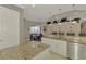Granite kitchen island with double sink and stainless steel dishwasher at 2744 Mill Creek Rd, Port Charlotte, FL 33953