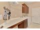 Convenient laundry room with washer, dryer, and storage at 2744 Mill Creek Rd, Port Charlotte, FL 33953