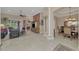 Spacious living area with tiled floors, a large TV, and comfy seating at 2744 Mill Creek Rd, Port Charlotte, FL 33953
