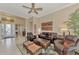 Bright and airy living room with comfortable seating and high ceilings at 2744 Mill Creek Rd, Port Charlotte, FL 33953