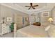 Main bedroom with multiple dressers and ceiling fan at 2744 Mill Creek Rd, Port Charlotte, FL 33953