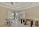 Bright office with built-in workspace and access to backyard at 2744 Mill Creek Rd, Port Charlotte, FL 33953