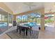 Relaxing covered patio with pool and outdoor dining area at 2744 Mill Creek Rd, Port Charlotte, FL 33953