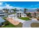 Waterfront property with lush landscaping and circular driveway at 3015 Curry Ter, Port Charlotte, FL 33981